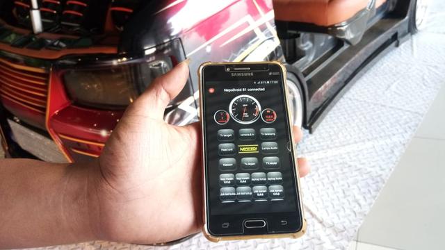 sistem canggih yang mampu mengendalikan kendaraan melalui ponsel