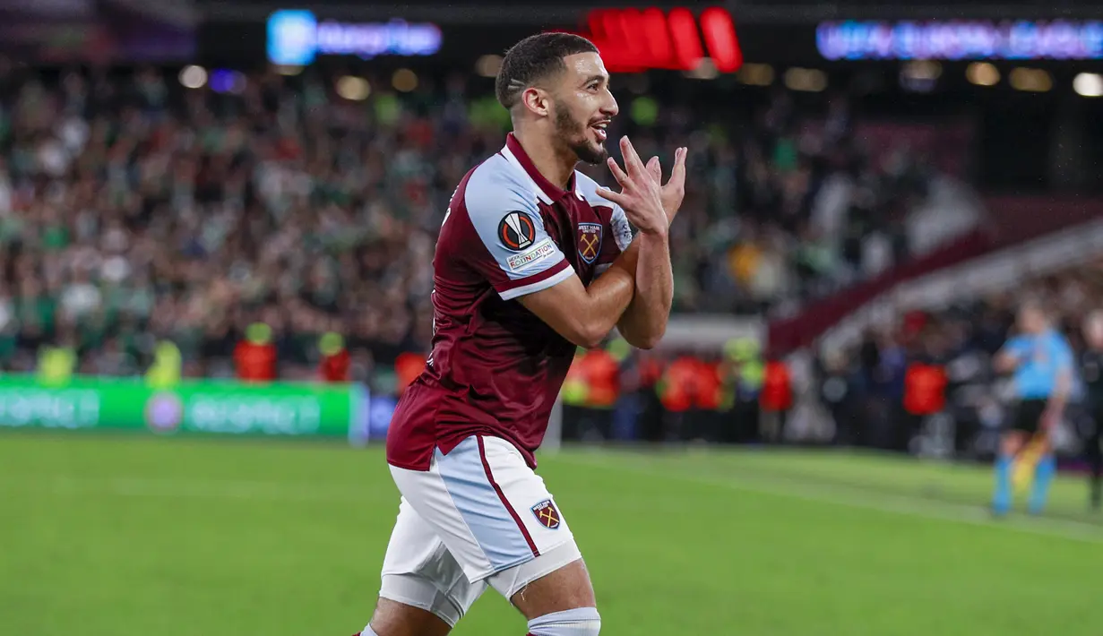 Penyerang West Ham United Said Benrahma merayakan gol yang dicetaknya ke gawang Rapid Wina pada matchday kedua Grup H Liga Europa 2021/22 di London Stadium, Jumat (1/10/2021) dini hari WIB. West Ham berhasil bermain gemilang dengan memenangkan pertandingan dengan skor 2-0. (AP Photo/Ian Walton)