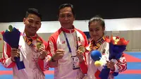 Ahmad Zigi Yuda dan Krisda Putri Aprilia meraih emas pada SEA Games 2019. (dok. KONI)