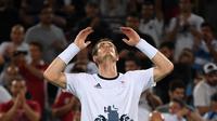 Andy Murray merebut medali emas setelah mengalahkan Juan Martin del Potro pada final tenis putra Olimpiade Rio de Janeiro 2016, Senin (15/8/2016) pagi WIB. (REUTERS/Toby Melville)