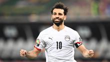 Mohamed Salah berhasil menjadi penentu kemenangan Mesir saat menumbangkan Pantai Gading di babak 16 besar Piala Afrika 2021 yang berlangsung di Stade Omnisport de Douala, Rabu (26/1/2022) malam WIB. (AFP/Charly Triballeau)
