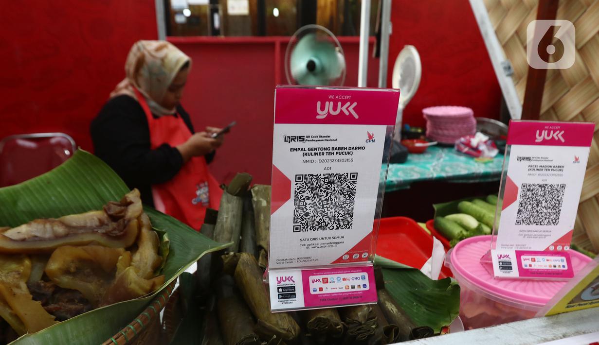 Bank Indonesia  (BI) telah memutuskan transaksi QRIS di bawah Rp 100 ribu tidak akan terkena biaya per 1 September 2023. (Liputan6.com/Angga Yuniar)