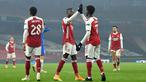 Gelandang Arsenal, Nicolas Pepe, merayakan gol yang dicetaknya ke gawang Molde pada laga lanjutan Grup B Liga Europa 2020/2021 di Emirates Stadium, Jumat (6/11/2020) dini hari WIB. Arsenal menang 4-1 atas Molde. (AFP/Glyn Kirk)