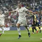 Striker Real Madrid, Gareth Bale, melakukan selebrasi setelah membobol gawang Leganes dalam laga lanjutan La Liga, di Santiago Bernabeu, Minggu (2/9/2018) dini hari WIB. (AP Photo/Andrea Comas)