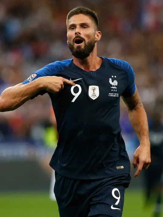 Striker Prancis, Oliver Giroud berselebrasi usai mencetak gol ke gawang Belanda pada pertandingan UEFA Nations League di Stadion Stade de France, Saint-Denis, Prancis, (9/10). Prancis menang 2-1 atas Belanda. (AP Photo/Christophe Ena)