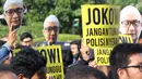 Peserta Aksi 365 menuntut kasus Novel Baswedan yang tak kunjung terungkap, seberang Istana Negara, Jakarta, Rabu (11/4). Novel Baswedan diserang dalam perjalanan usai menjalankan sala subuh dari masjid. (Liputan6.com/Immanuel Antonius)