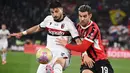 Hingga akhir babak pertama, tidak ada satu pun gol yang tercipta. (Isabella BONOTTO/AFP)