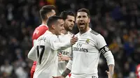 1. Real Madrid - Bintang 5 (Attack 84, Midfield 89, Defence 86), Pemain terbaik (Luka Modric (OVR 91), Sergio Ramos (OVR 91), Thibaut Courtois (OVR 90)) (AFP/Javier Soriano)