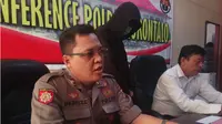 Pemuda pelaku ujaran kebencian, yang diketahui  berinisial IB, warga kelurahan Dulalowo, Kota Gorontalo itu kini mendekam di tahanan Polda Gorontalo. (Liputan6.com/Andri Arnold)
