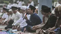 Jemaah Muhammadiyah saat menunaikan Salat Idul Fitri 1444 H di halaman Jakarta International Equestrian Park, Pulomas, Jakarta Timur, Jumat (21/4/2023). (merdeka.com/Iqbal S Nugroho)