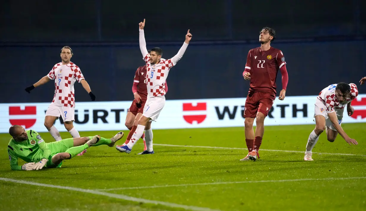 Luka Modric dkk butuh kemenangan untuk memastikan itu tanpa harus memedulikan hasil laga Wales kontra Turki. (AP Photo/Darko Bandic)