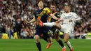 Keunggulan 1-0 Real Madrid atas Girona bertahan hingga waktu turun minum. (Pierre-Philippe MARCOU/AFP)