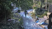 Pemukiman rusak akibat banjir di Sisilia, Italia sejak pekan ini. Pada 4 November 2018, banjir menelan setidaknya belasan korban jiwa. (AFP PHOTO)
