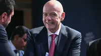 Presiden FIFA, Gianni Infantino, bereaksi saat resepsi dengan para pemimpin bisnis di sela-sela pertemuan tahunan Forum Ekonomi Dunia (WEF) di Davos pada 21 Januari 2026. Forum Ekonomi Dunia berlangsung di Davos dari 19 Januari hingga 23 Januari 2026. (Mandel NGAN/AFP)