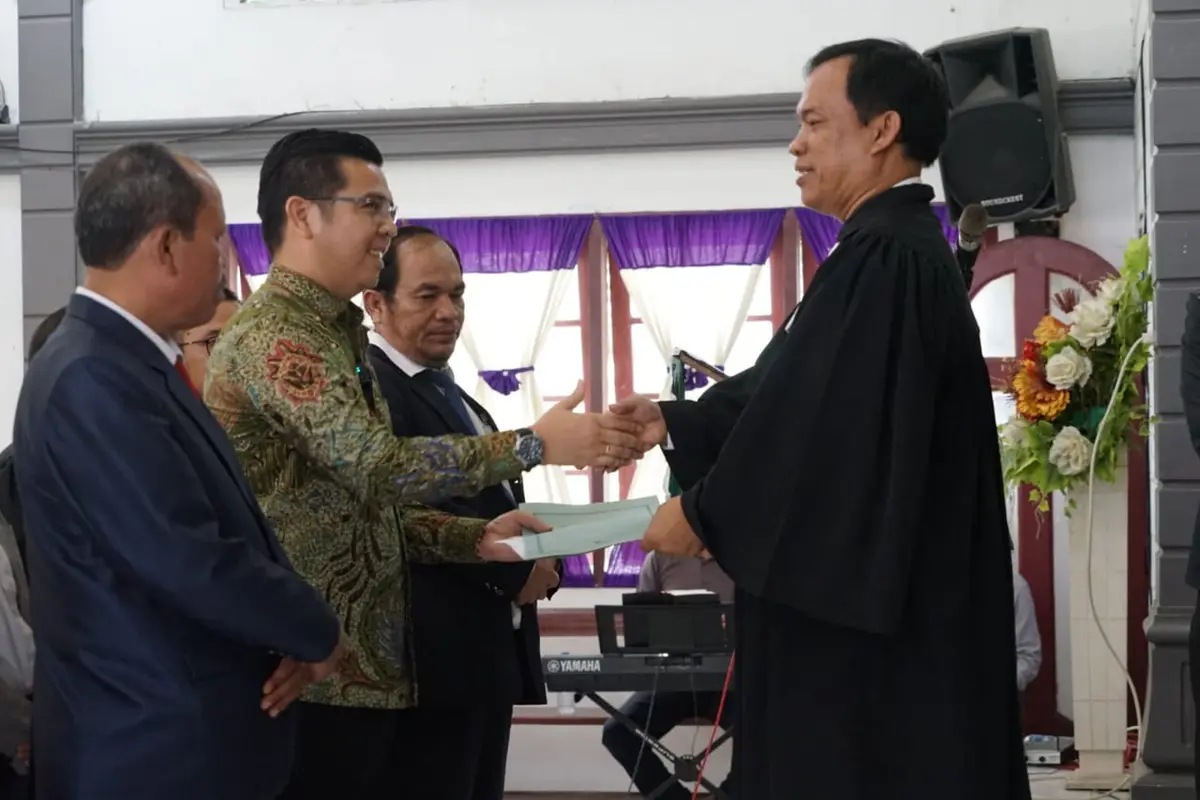 Bane Raja Manalu didaulat sebagai Ketua Umum Panitia Tahun Profesionalisme Dalam Penatalayanan HKBP Se Distrik V Sumatera Timur. (Istmewa).