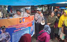 Aksi Polisi Datangi Pasar di Pelalawan, Edukasi Pedagang Terkait Pilkada
