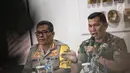 Kapendam Jaya Kolonel Kristomei Sianturi memberikan keterangan terkait penembakan perwira TNI AD, Letkol Dono Kuspriyanto di Makodam Jaya, Rabu (26/12). Pelaku merupakan anggota TNI AU yang juga bertugas sebagai polisi militer (Liputan6.com/Faizal Fanani)