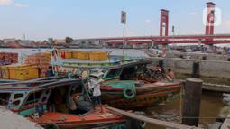 Dermaga 16 Ilir di Palembang merupakan salah satu pelabuhan tradisional yang berperan penting dalam aktivitas transportasi dan perdagangan di sepanjang Sungai Musi. (Liputan6.com/Herman Zakharia)