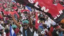 Pendukung Presiden Nikaragua Daniel Ortega merayakan Revolusi Sandinista ke-36 di Managua, Minggu, (19/7/2015). Sandinista atau Frente Sandinista de Liberación Nacional yang disingkat FSLN merupakan suatu partai politik. (REUTERS/Oswaldo Rivas)