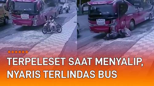 VIDEO: Terpeleset Saat Menyalip, Seorang Perempuan Nyaris Terlindas Bus