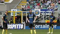 Para pemain Inter Milan tertunduk lesu usai dikalahkan Sassuolo (AP Photo/Antonio Calanni)