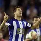 Pemain belakang Real Sociedad, Inigo Martinez, melakukan selebrasi usai mencetak gol ke gawang Real Madrid dalam lanjutan La Liga 2014-2015 di Stadion Anoeta, (1/9/2014). (REUTERS/Vincent West)