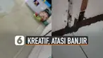 Ide kreatif disebarkan oleh seorang pemuda dalam mengatasi agar rumahnya tidak kemasukan air saat banjir.