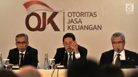 Kepala Eksekutif Pengawas Perbankan Otoritas Jasa Keuangan (OJK) Heru Kristiyana (tengah) memberi keterangan terkait paket kebijakan untuk peningkatan ekspor dan perekonomian nasional di Jakarta, Rabu (15/8). (Merdeka.com/Iqbal Nugroho)