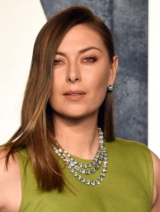 <p>Mantan Petenis Russia, Maria Sharapova berpose saat menghadiri Vanity Fair Oscar Party 2023 di Wallis Annenberg Center for the Performing Arts, Beverly Hills, California, 13 Maret 2023 WIB. (AFP/Getty Images/Amy Sussman)</p>
