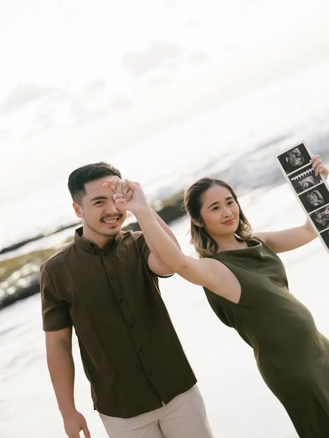 6 Gaya Maternity Shoot Gritte Agatha yang Tengah Hamil Anak Pertama, Elegan Bergaun Hijau Berpose di Pantai