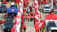 Pemandangan umum (a general view) kegiatan berkumpul (tailgating) sebelum pertandingan Indiana Hoosiers dan Illinois Fighting Illini di Memorial Stadium pada 20 September 2025 di Bloomington, Indiana. (Caleb Bowlin/Getty Images via AFP)