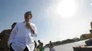 Rabu (6/8/14), Gubernur DKI Jakarta Jokowi meninjau lokasi waduk Marunda yang sempat terhenti akibat pembebasan lahan yang masih bermasalah, Jakarta. (Liputan6.com/Herman Zakharia)