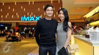 Pasangan selebriti, Ririn Dwi Ariyanti dan Aldi Bragi ketika ditemui di premiere film Terminator Genisys di Gandaria City XXI, Jakarta, Rabu (24/6/2015). Terminator Genisys menceritakan tentang kehidupan di tahun 2029.(Liputan6.com/Panji Diksana) 
