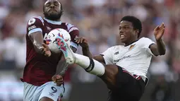 Setan Merah kalah dari tuan rumah West Ham United dengan skor 1-0.  (AP Photo/Ian Walton)