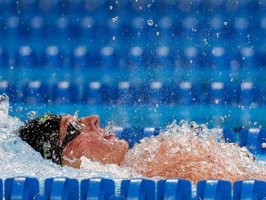 Perenang AS, Ryan Lochte, jadi pembicaraan karena melakukan tindakan memalukan saat Olimpiade 2016 Rio de Janeiro. Dirinya mengaku dirampok oleh orang-orang berseragam polisi, namun ternyata pengakuannya itu adalah sebuah kebohongan. (AFP/Al Bello)