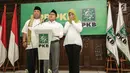 Ketum PKB, Muhaimin Iskandar (tengah) bersama pasangan Cagub-Cawagub Arinal Djunaidi (kiri) dan Chusnunia Chalim untuk Pilkada Lampung 2018 memberi sambutan di Gedung DPP PKB, Jakarta, Rabu (20/12). (Liputan6.com/Faizal Fanani)