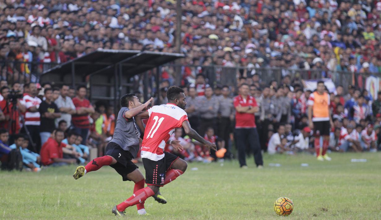 Madura United menjadi klub baru yang memiliki potensi untuk menjadi klub besar karena memiliki basis masa pendukung yang loyal. (Bola.com/Vitalis Yogi Trisna)