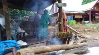 Lemang bambu, kuliner khas Sulsel yang wajib ada dalam perayaan Idul Fitri (Liputan6.com/ Eka Hakim)