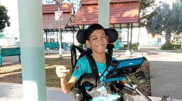 Penyandang disabilitas cerebral palsy Mohd Sayfullah.