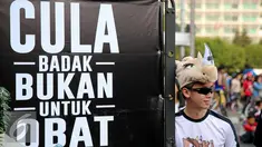 Dunia Aktivis saat mensosialisasikan hari Badak Dunia di Jakarta, Minggu (27/9/201). Kampanye dilakukan untuk penyadartahuan dan penyelematan Badak Sumatera dan Badak Jawa yang populasinya tiap tahun makin berkurang. (Liputan6.com/Faizal Fanani)