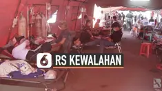 Dengan kembali meningkatnya penularan COVID-19 hinga sempat mencapai 20,000 kasus perhari, banyak rumah sakit di Indonesia kebanjiran pasien, seperti RSUD Kota Bekasi, Jawa Barat ini, sehingga harus membangun tenda-tenda darurat .