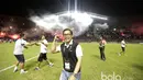 Ekspresi pelatih Arema FC, Aji Santoso usai timnya meraih juara Piala Presiden 2017 di Stadion Pakansari, Bogor, Minggu (12/3/2017). (Bola.com/Nicklas Hanoatubun)