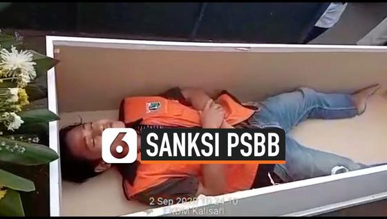 VIDEO: Tidak Memakai Masker Dimasukkan ke Dalam Peti Mati