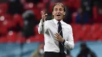 Pelatih Italia, Roberto Mancini bereaksi ketika pertandingan 16 besar Euro 2020 antara Italia melawan Austria yang berlangsung di Stadion Wembley, London, Inggris pada Sabtu (26/06/2021). (AP/Pool/Ben Stansall)