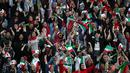 Wanita Iran bersorak saat negaranya mencetak gol ke gawang Kamboja pada laga kualifikasi Piala Dunia 2022 di Stadion Azadi, Teheran, Iran, Kamis (10/10/2019). Sebelumnya, seorang wanita membakar diri karena takut dipenjara setelah menonton bola dalam stadion. (AP Photo/Vahid Salemi)