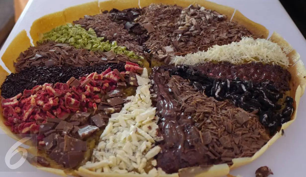 Martabak delapan rasa atau dikenal dengan nama Markobar menjadi salah satu jamuan yang dihidangkan dalam resepsi pernikahan Gibran Rakabuming Raka dan Selvi Ananda di Graha Saba Buana, Sumber, Solo, Kamis (11/6/2015). (Liputan6.com/Herman Zakharia) 