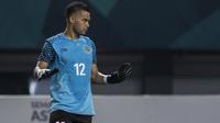 Kiper Indonesia, Andritany Ardhiyasa, saat melawan Palestina pada laga Asian Games di Stadion Patriot, Jawa Barat, Rabu (15/8/2018). Indonesia takluk 1-2 dari Palestina. (Bola.com/Vitalis Yogi Trisna)
