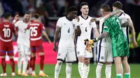 Reaksi para pemain Inggris usai pertandingan sepak bola Euro 2024 Grup C melawan Serbia di Arena AufSchalke di Gelsenkirchen pada 16 Juni 2024. (KENZO TRIBOUILLARD/AFP)