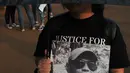 Massa dari Koalisi Solidaritas untuk Jopi melakukan aksi kamisan di depan Istana Negara, Jakarta, Kamis (2/7/15). Dalam aksinya mereka meminta kepada Jokowi untuk menuntaskan kasus pembunuhan Jopi. (Liputan6.com/Herman Zakharia)