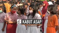 Suasana pagi kota Palangka Raya diselimuti kabut asap kebakaran hutan. Aktivitas di sejumlah tempat mulai terganggu, karena asap iritasi mata dan berdampak buruk bagi pernafasan warga